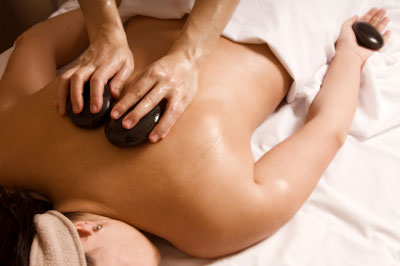ayurvedic clay hot stone massage